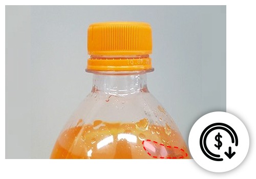 Defect detected on a orange soda bottle 